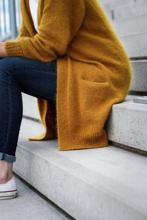 Ingen Dikkedarer cardigan, curry yellow knitted cardigan designed by Petiteknit