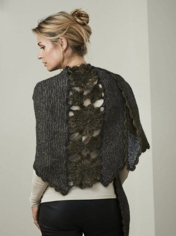 Lenes shawl, a knitted shawl with a flower panel at the back, made in black Isager Highland wool and Silk Mohair