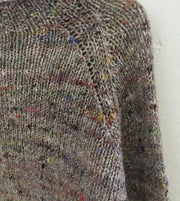 Knitted sweater with specks, beige background color and multicolored specks, knitted in Önling no 5