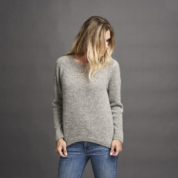 Dagmar classic, knitted grey sweater with braids at the sides, made in Isager alpaca and spinni wool, the front